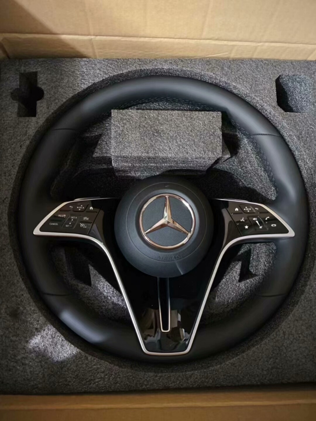 Brand-new Mercedes-Benz butterfly steering wheel Specifically designed for 10th to 24th generation Mercedes-Benz E-Class models, including the E200 and E300L upgrades.