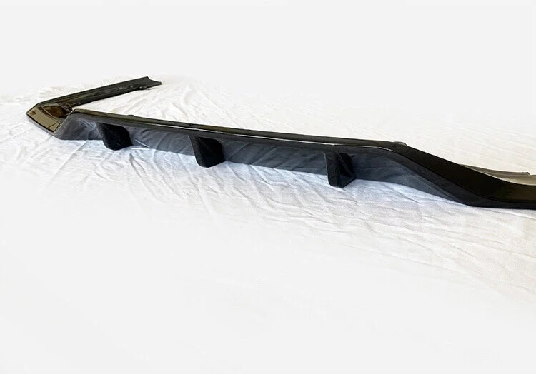 BMW 7 Series (G11/G12) Rear Diffuser Lip – Gloss Black or Carbon Fiber Texture Finish