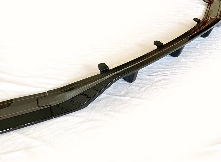 BMW 7 Series (G11/G12) Rear Diffuser Lip – Gloss Black or Carbon Fiber Texture Finish