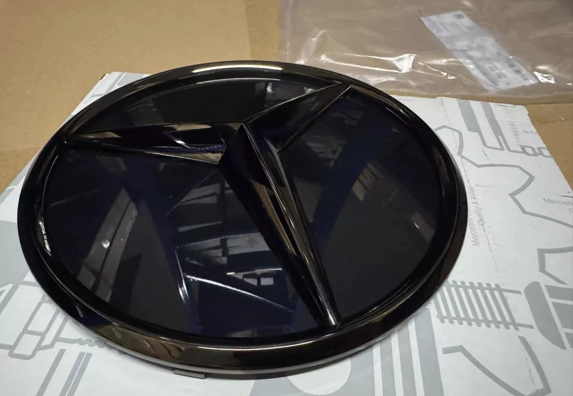 Mercedes-Benz G-Class W465 2025 OEM Illuminated Grille Emblem (Smoked Black)