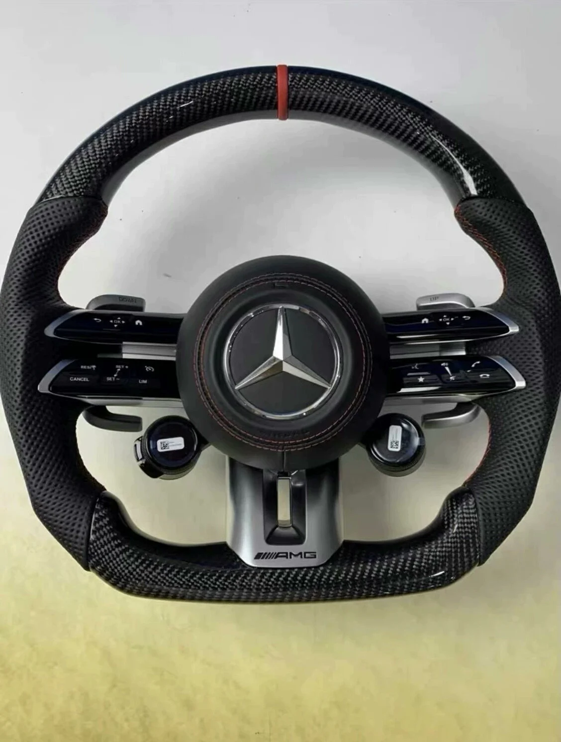 Mercedes-Benz 801 AMG Carbon Fiber Steering Wheel Assembly Supports retrofitting old models with new features. Multi-function buttons + carbon fiber paddle shifters