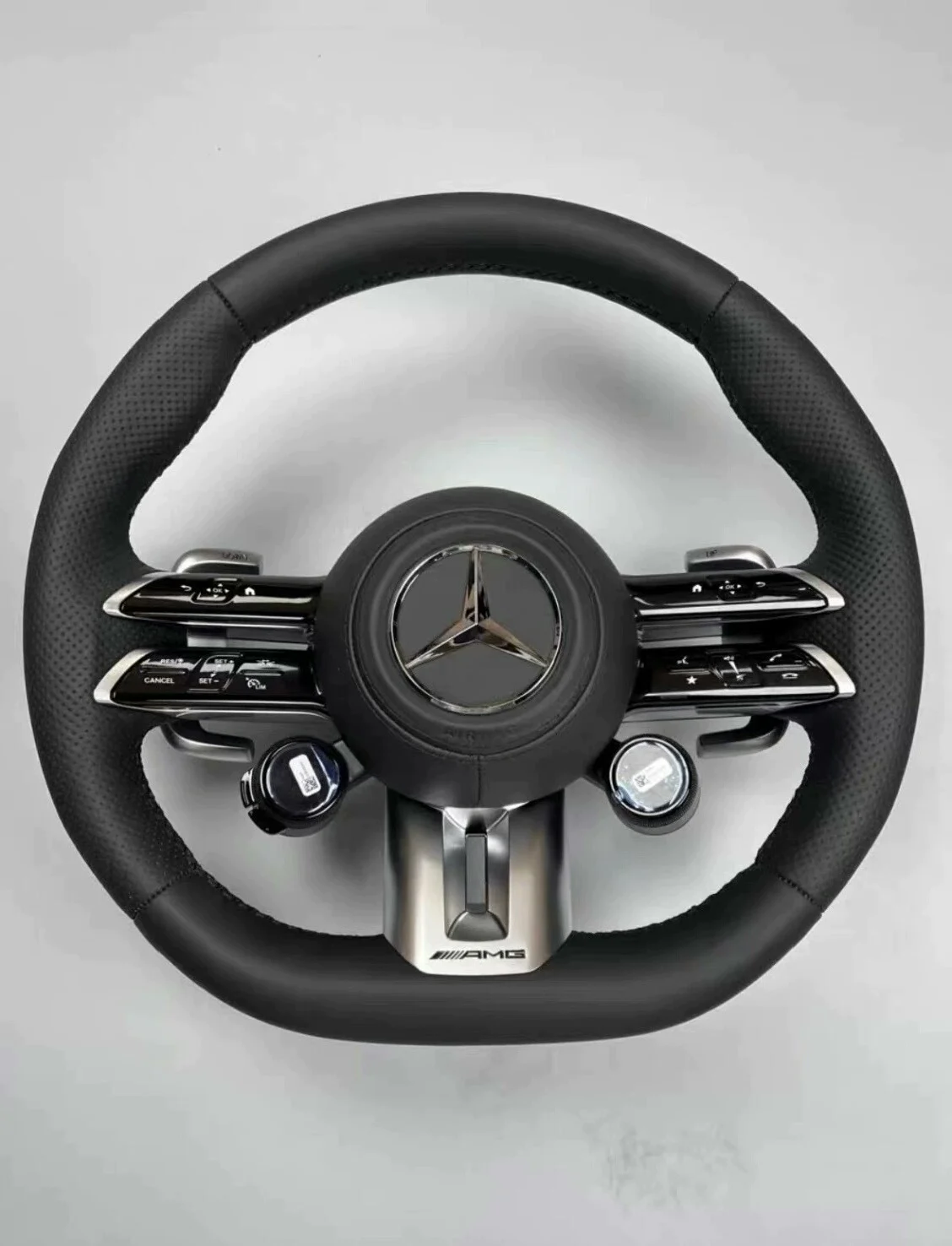 Mercedes-Benz 801 AMG Carbon Fiber Steering Wheel Assembly Supports retrofitting old models with new features. Multi-function buttons + carbon fiber paddle shifters
